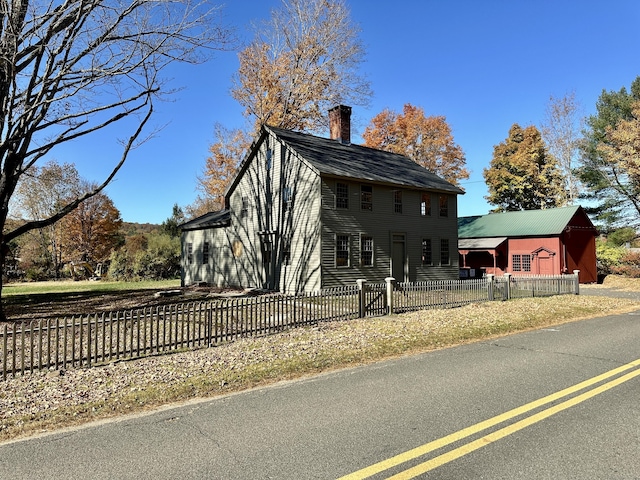 27 Middle Quarter Rd, Woodbury, CT 06798 - view of front of house featuring a chimney and a fenced front yard