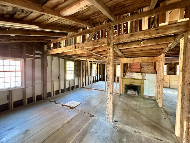 27 Middle Quarter Rd, Woodbury, CT 06798 - miscellaneous room featuring hardwood / wood-style floors, healthy amount of natural light, and a fireplace