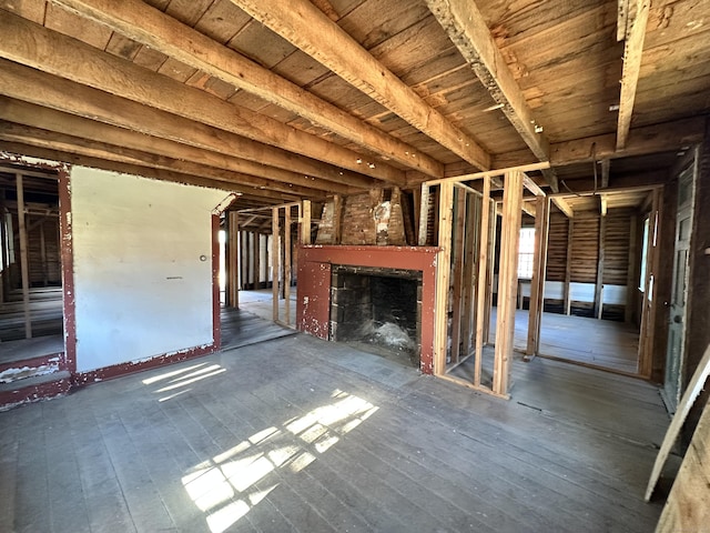 27 Middle Quarter Rd, Woodbury, CT 06798 - misc room with an outdoor fireplace and hardwood / wood-style floors