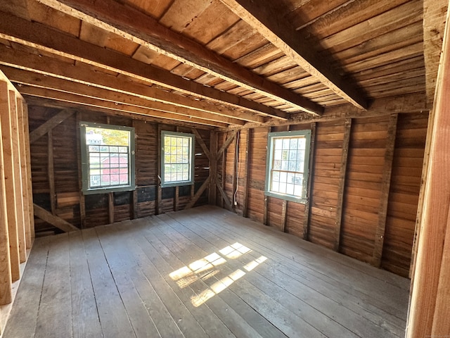 attic featuring a wealth of natural light