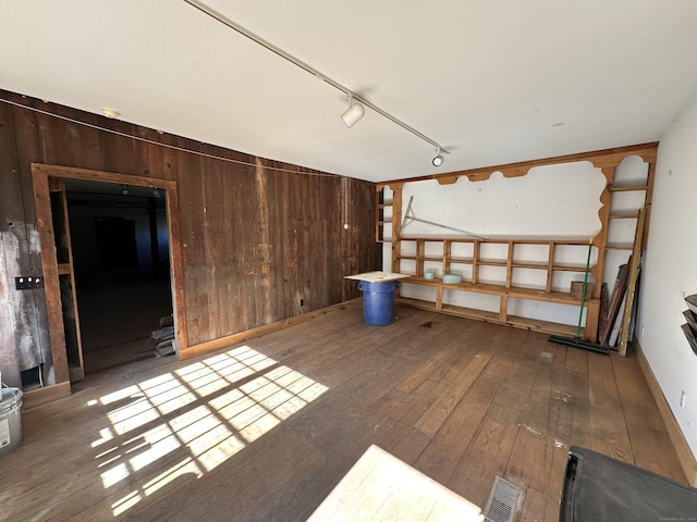 27 Middle Quarter Rd, Woodbury, CT 06798 - spare room with hardwood / wood-style flooring, track lighting, and wood walls