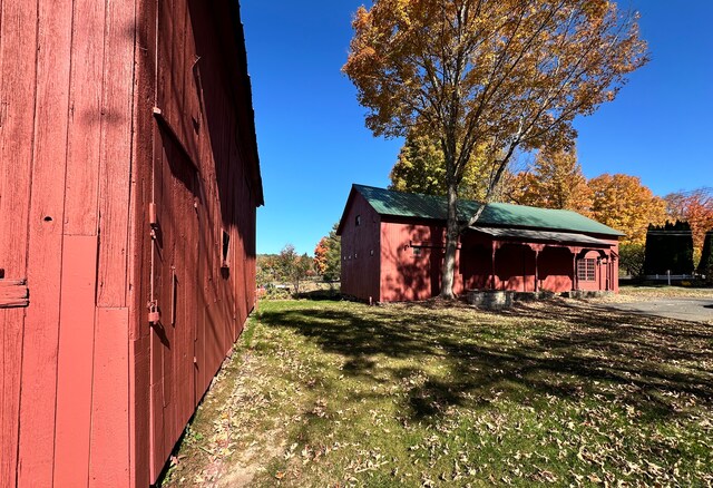 exterior space with a shed