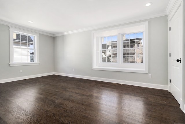 unfurnished room featuring crown molding and dark wood-type flooring