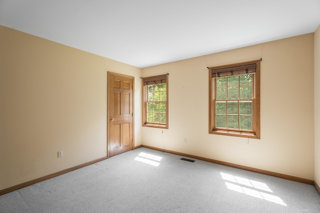 view of carpeted spare room