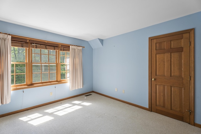 view of carpeted spare room