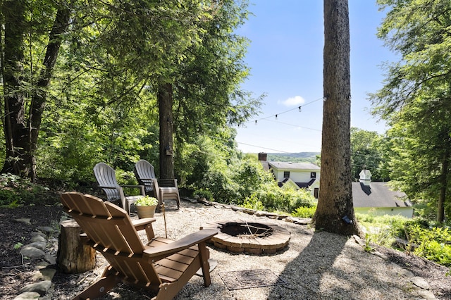 view of patio featuring a fire pit