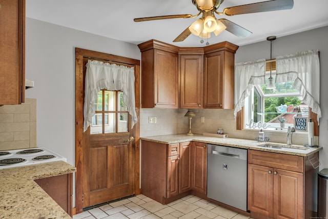 kitchen featuring dishwasher, ceiling fan, light stone counters, and backsplash