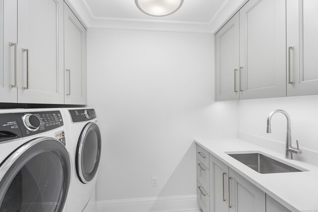 405 Whitfield St Unit 3, Guilford, CT 06437 - clothes washing area with cabinet space, crown molding, a sink, and separate washer and dryer