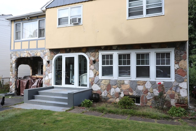 25 Muriel St, Norwalk, CT 06851 - rear view of house featuring stucco siding and stone siding