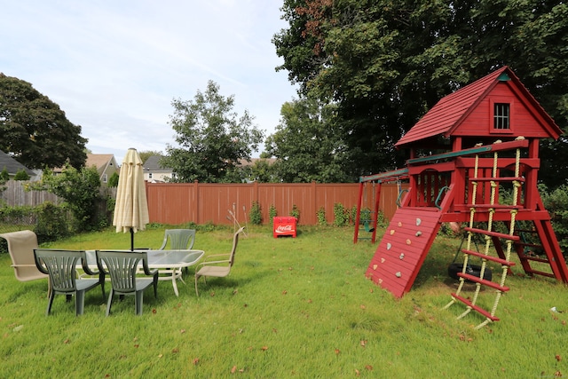 view of yard with a playground