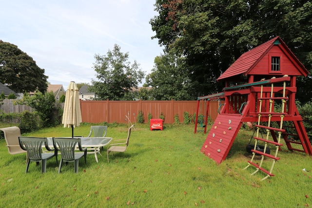 25 Muriel St, Norwalk, CT 06851 - view of play area featuring a lawn and fence