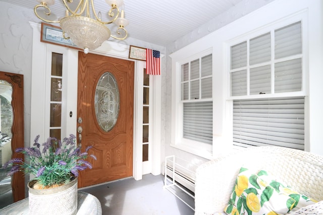 25 Muriel St, Norwalk, CT 06851 - view of exterior entry with covered porch and a baseboard radiator