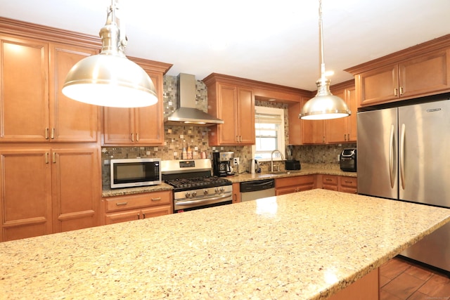 25 Muriel St, Norwalk, CT 06851 - kitchen with decorative backsplash, appliances with stainless steel finishes, a sink, light stone counters, and wall chimney exhaust hood