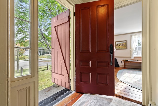 entryway with light hardwood / wood-style flooring