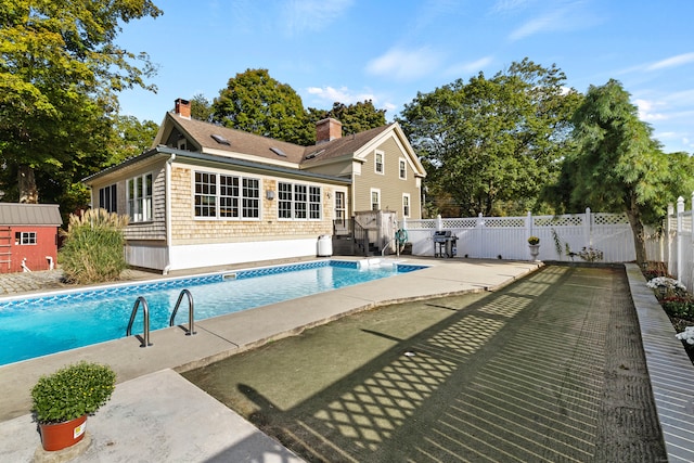 view of pool with a patio area