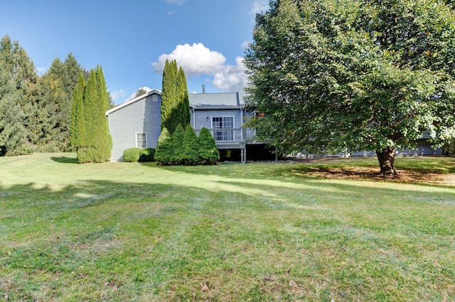 view of yard with a deck