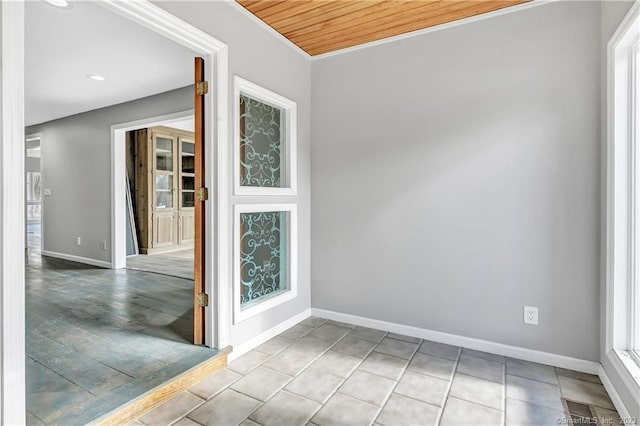 empty room with wooden ceiling