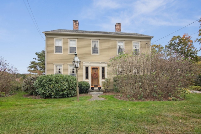 66 Artillery Rd, Middlebury, CT 06762 - colonial-style house featuring a front yard and a chimney