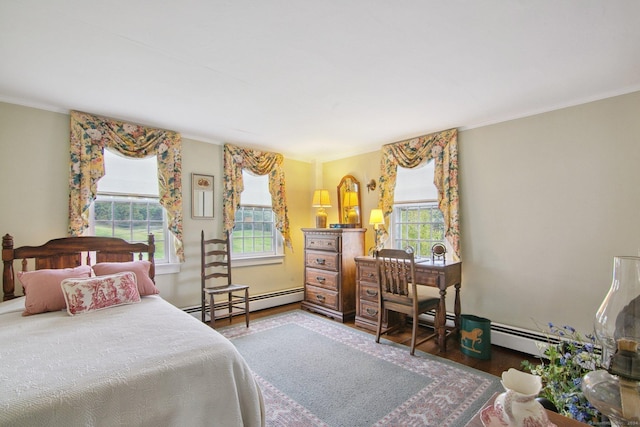 66 Artillery Rd, Middlebury, CT 06762 - bedroom featuring a baseboard heating unit, multiple windows, wood finished floors, and ornamental molding