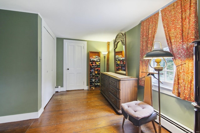 66 Artillery Rd, Middlebury, CT 06762 - corridor with a baseboard radiator, hardwood / wood-style floors, and baseboards