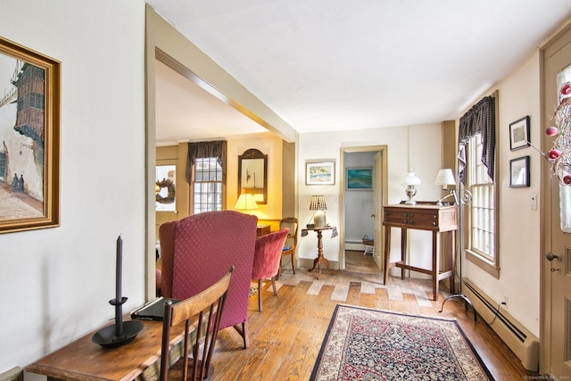 66 Artillery Rd, Middlebury, CT 06762 - sitting room with baseboard heating, light wood finished floors, and healthy amount of natural light