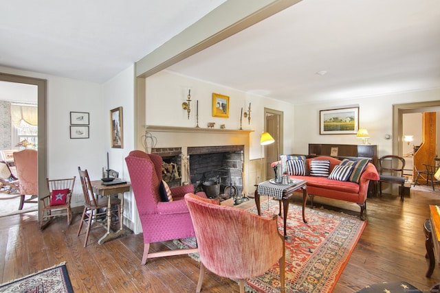 living room featuring dark wood-type flooring