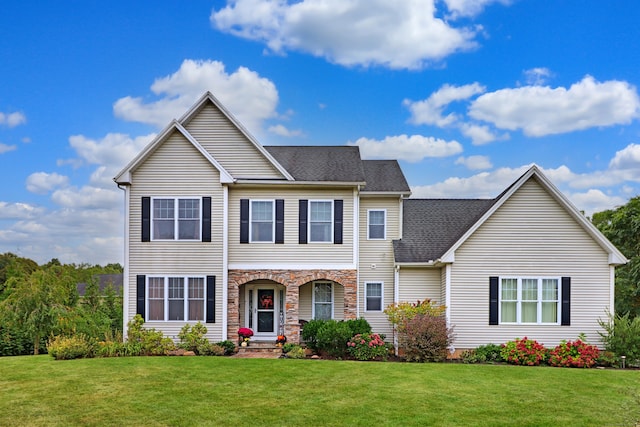 view of front facade with a front lawn