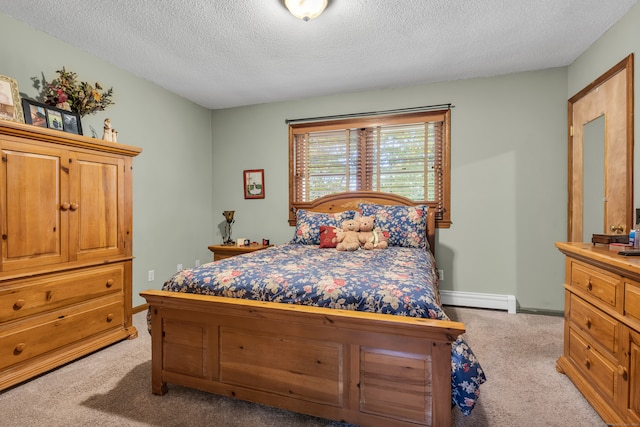 bedroom featuring light colored carpet, a textured ceiling, and baseboard heating