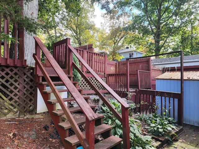 view of playground with a wooden deck