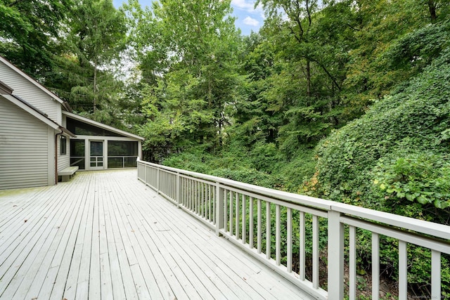 deck with a sunroom