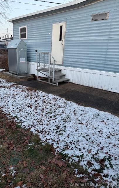 view of snow covered property