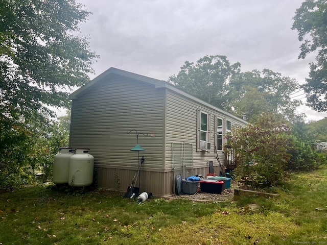 view of home's exterior featuring a lawn