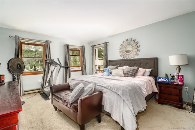 carpeted bedroom featuring multiple windows