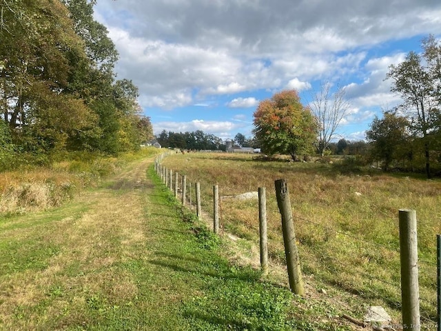 exterior space with a rural view