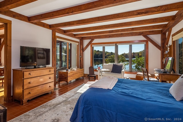 tiled bedroom with beamed ceiling