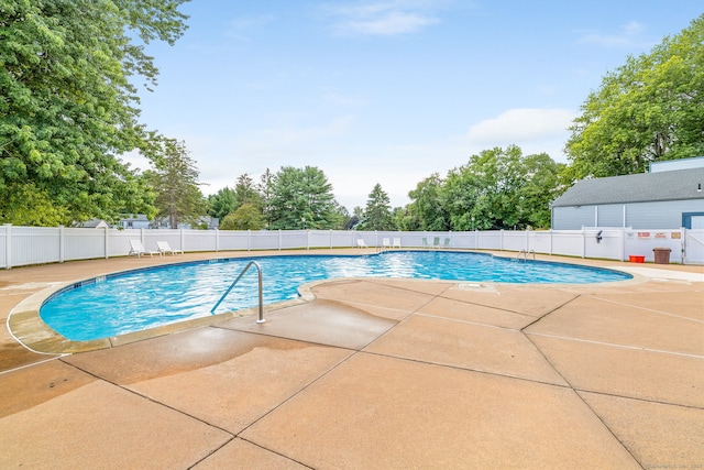 view of swimming pool featuring a patio