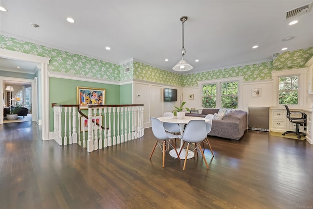 147 Old Church Rd, Greenwich, CT 06830 - dining room with wallpapered walls, crown molding, healthy amount of natural light, dark wood-style floors, and baseboards