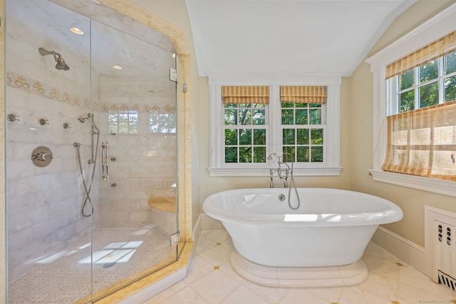 147 Old Church Rd, Greenwich, CT 06830 - bathroom featuring a soaking tub, a shower stall, baseboards, radiator, and vaulted ceiling