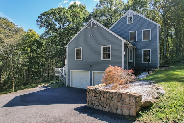 exterior space with a garage