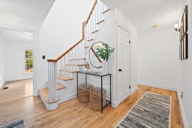 foyer with light wood-type flooring