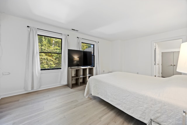 bedroom featuring light hardwood / wood-style floors