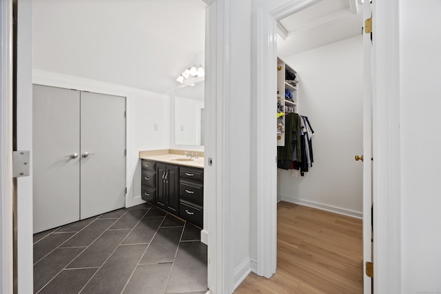 bathroom with vanity and hardwood / wood-style floors