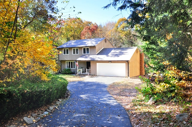 view of front of property with a garage