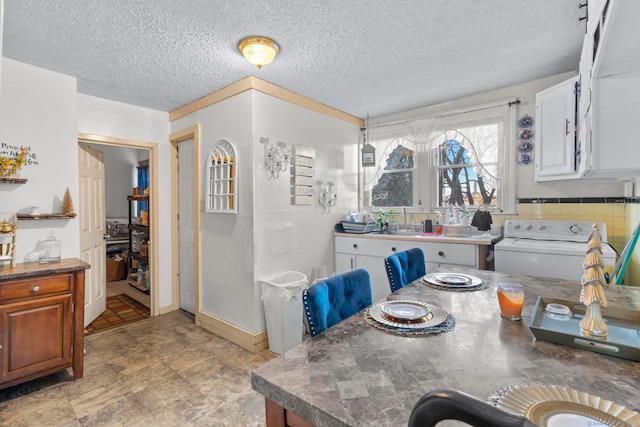 dining area with a textured ceiling