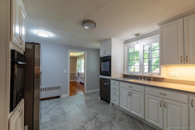 161 Dale Rd, Wethersfield, CT 06109 - kitchen with black appliances, light marble finish floors, white cabinetry, and a textured ceiling