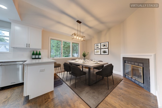 dining space with dark wood-type flooring