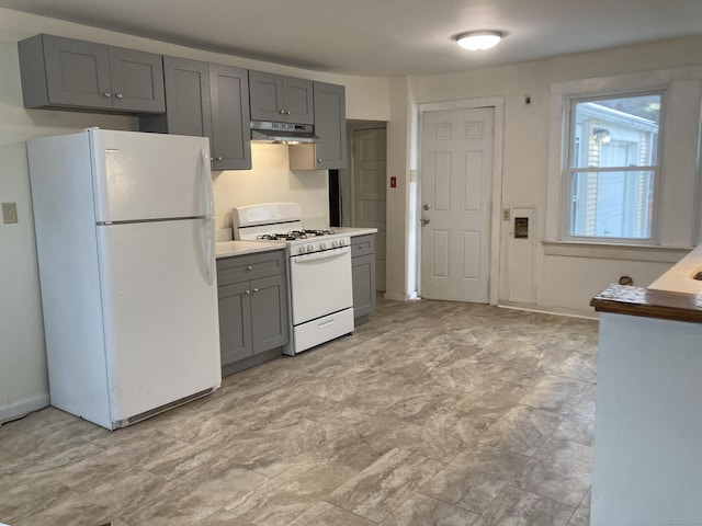 kitchen featuring gray cabinetry and white appliances