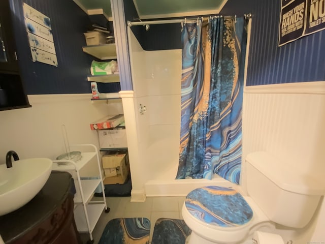 full bathroom with vanity, tile patterned flooring, shower / tub combo, and toilet