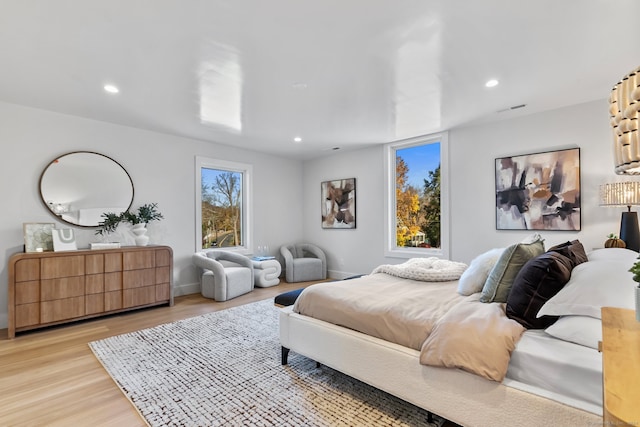 bedroom featuring light hardwood / wood-style floors