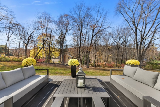 deck with an outdoor hangout area